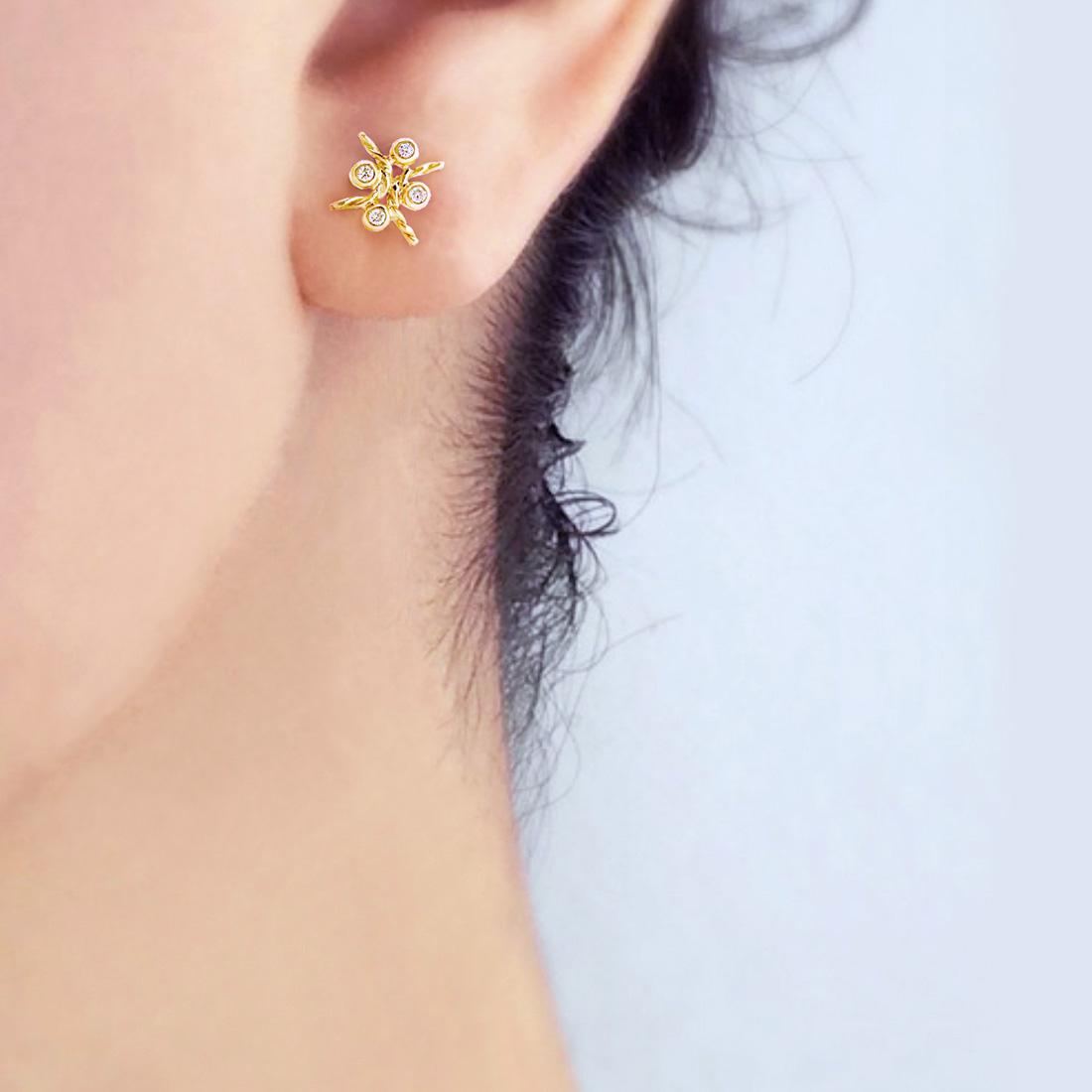 JeweLyrie-Diamond-Stud-Four-Star-crossing-Twist-stud-Earrings