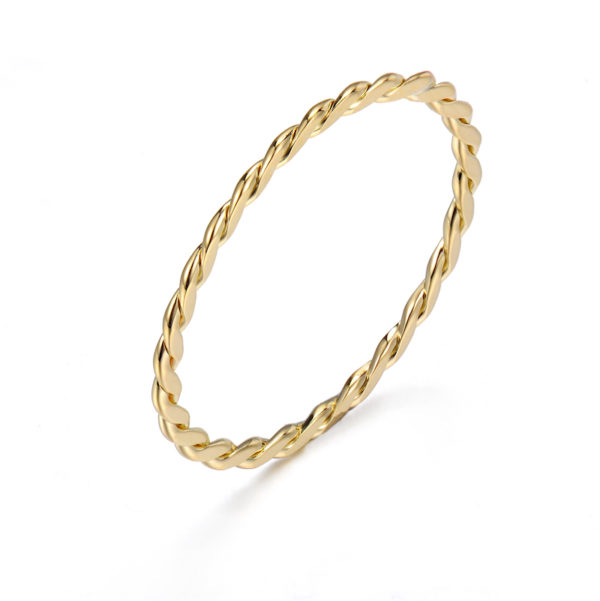 JeweLyrie Signature Gold Slim Twist 0.8mm band Ring Guard Spacer, makes statement from subtle to dashing, available in 14k and 18k by JeweLyrie.