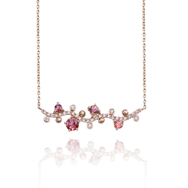 Pink Floral Vine Pendant Necklace with peach and pink sapphire, spinel and white diamonds scattered along sides of Pavé diamond wavy bar
