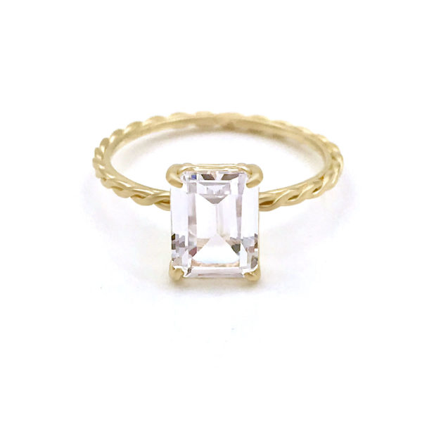 Emerald-cut clear topaz and diamond ring with signature twist setting and shank handcrafted in 14k and 18k made to order by JeweLyrie free domestic shipping